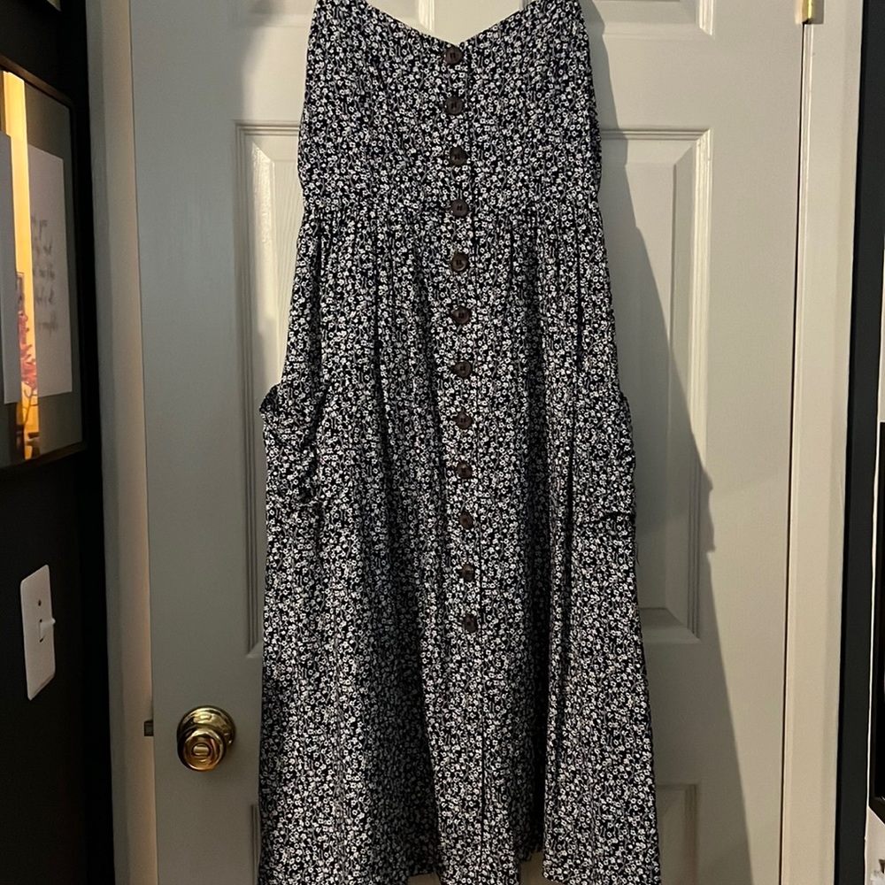 Floral print no sleeve button dress in a size large.